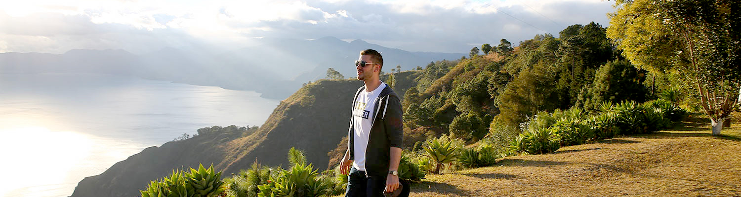 Person wearing Humber t-shirt walking outdoors
