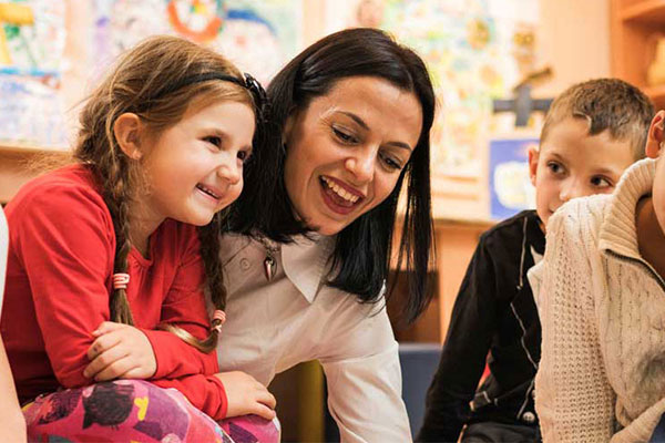 person sitting with children