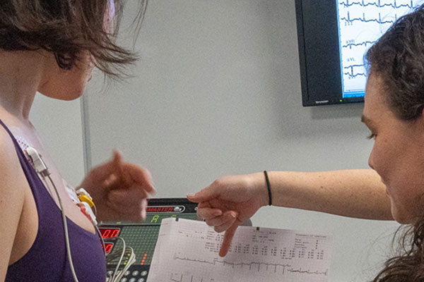 person showing someone there chart