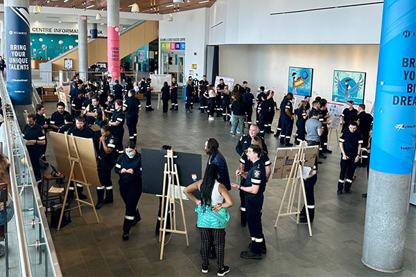 large group of paramedic students in a lobby