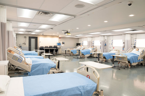Medical lab room with stools and beds