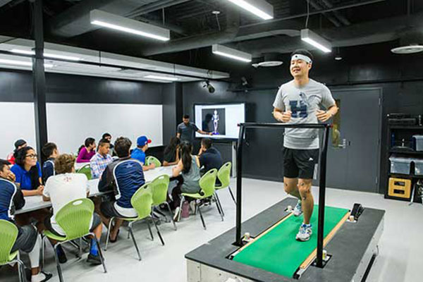 student running on a treadmill in the biometrics lab