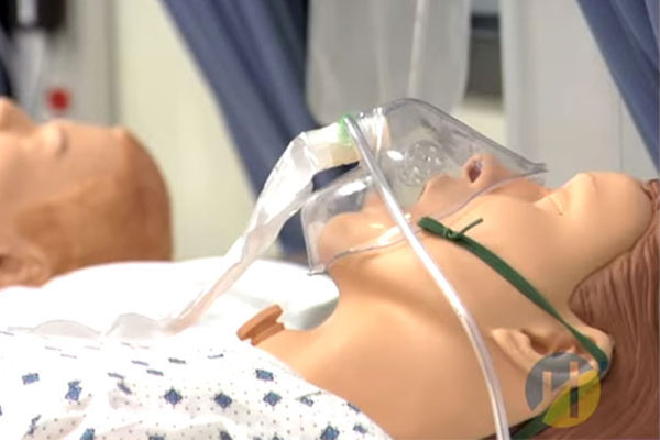 Clinical practice dummy wearing ventilator mask