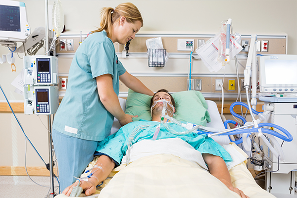 nurse working on patient