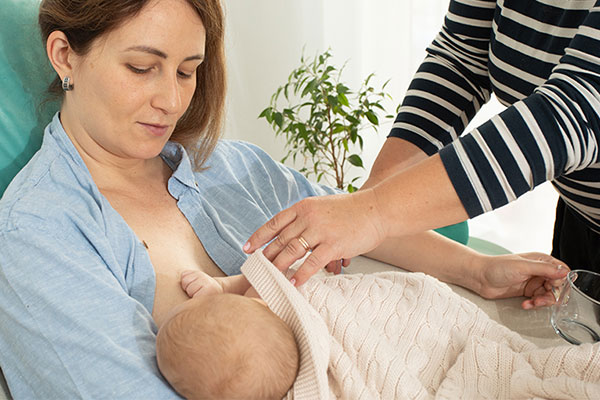 Woman breastfeeding a baby