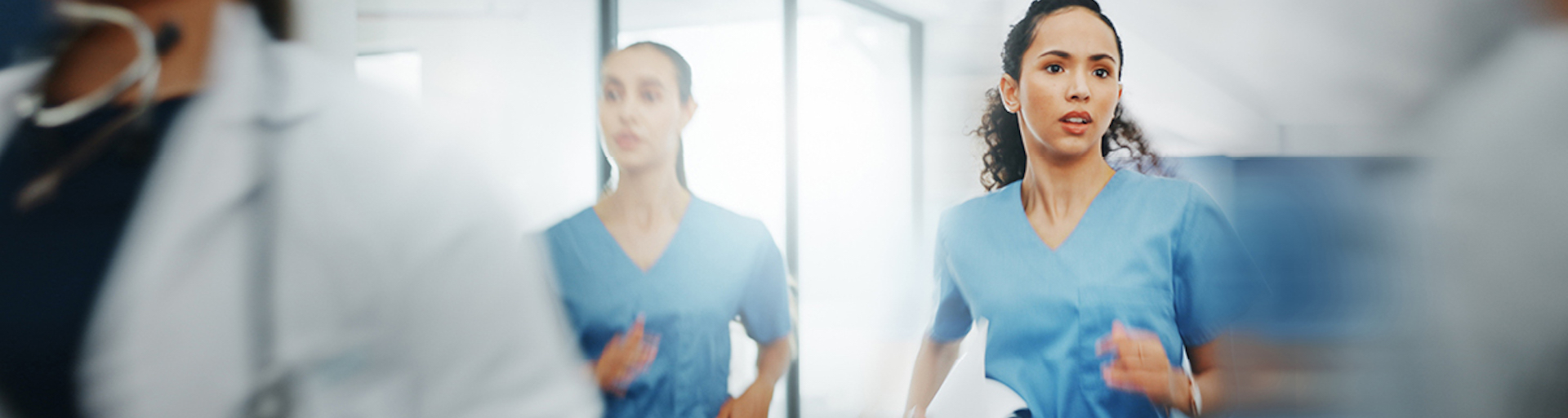 two nurses running