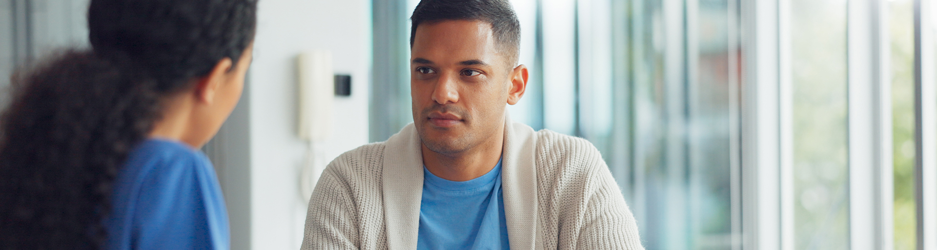 man speaking to professional