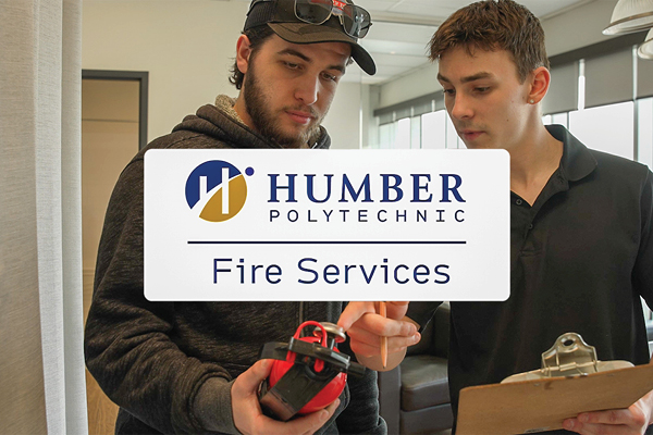 one person holding a fire extinguisher and one person holding a clipboard
