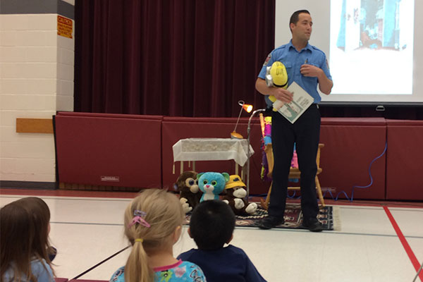 fireman presenting to children