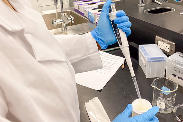 person performing a experiment